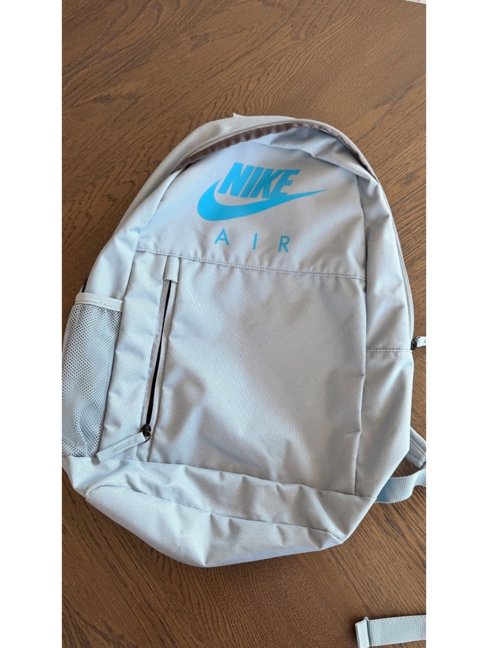 Nike Air Light Gray Backpack with Blue Logo